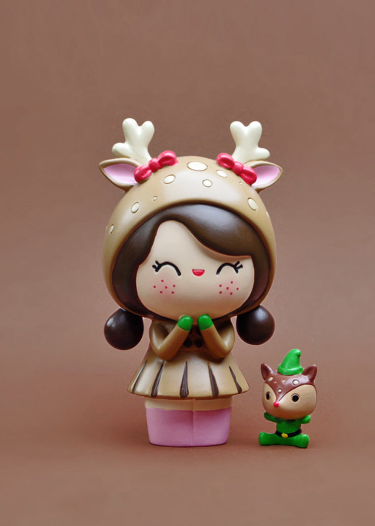 KIKO & KEN: Momiji doll in a reindeer suit smiles, standing beside a toy deer with green hat. Cute collectible display. — Momiji doll