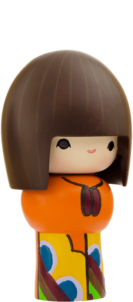 Rainbows Momiji doll with a brown bob, orange top, and yellow patterned skirt. Includes a secret message compartment. — Momiji doll