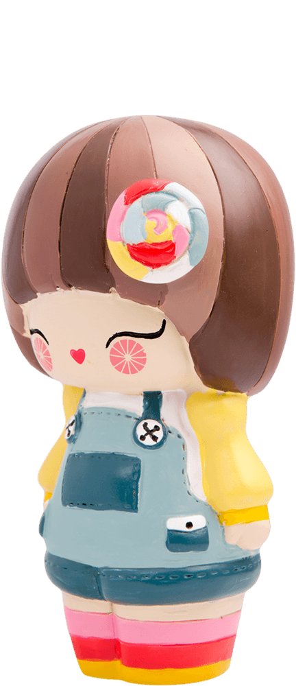 Darcie Dot Momiji doll with brown hair, colorful hair clip, blue overalls, yellow sleeves, and closed eyes. — Momiji doll