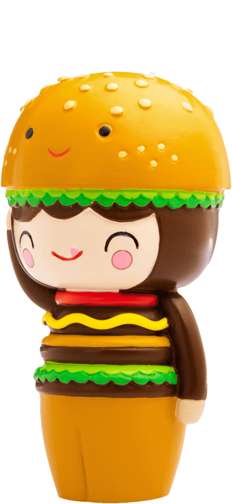Giggles Momiji doll smiles in a hamburger costume, with lettuce edges and a sesame bun hat; cute collectible figure. — Momiji doll
