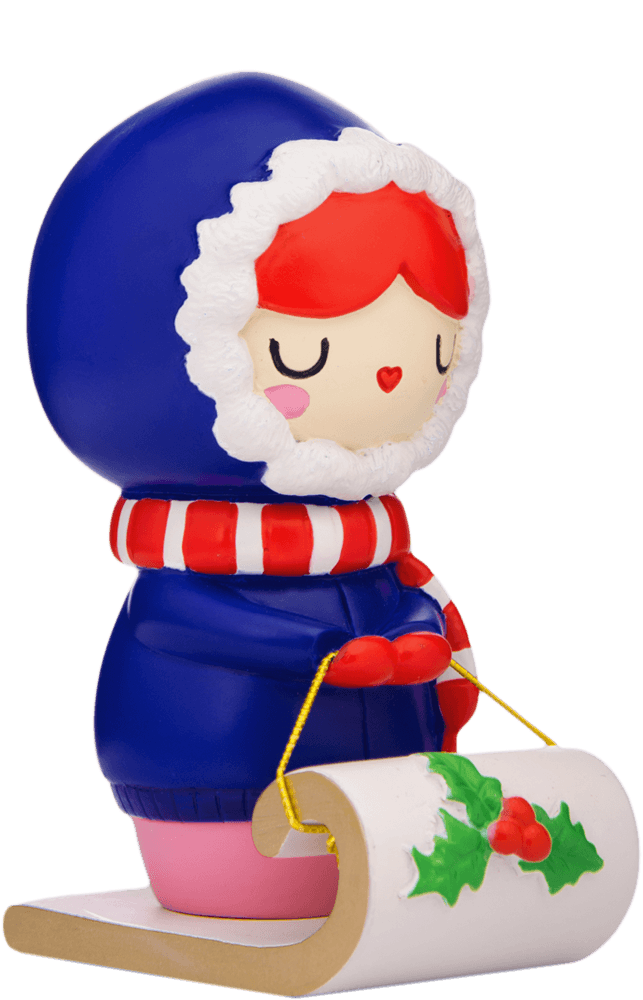 Pipaluk Momiji doll wears a blue parka, red mittens, and pulls a sled decorated with holly. Secret message hidden inside. — Momiji doll