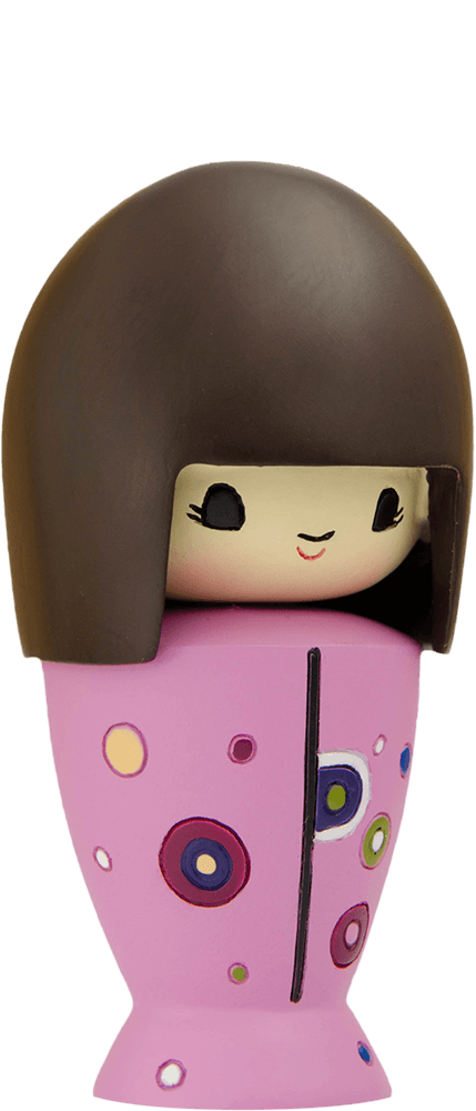 The Very Big Birthday Momiji doll has a brown bob and wears a pink outfit decorated with colorful circles and dots. — Momiji doll
