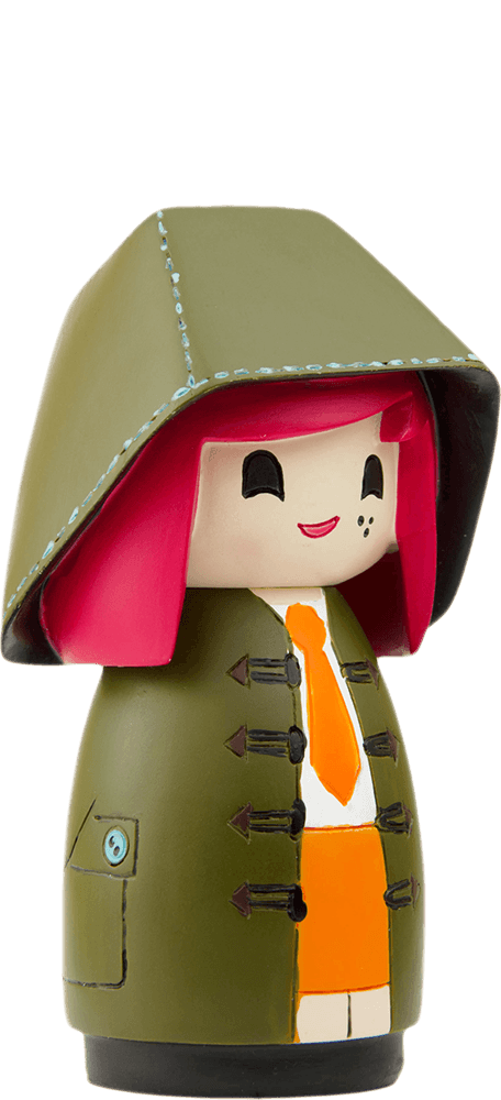 Mabel Momiji doll with pink hair, green hooded coat, orange skirt and a cheerful smile; kawaii collectible message doll. — Momiji doll