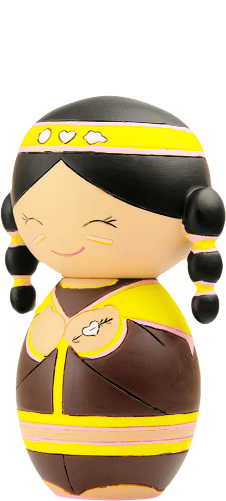 Souzi Momiji doll smiles with black braided hair and wears a yellow and brown heart-patterned outfit. — Momiji doll