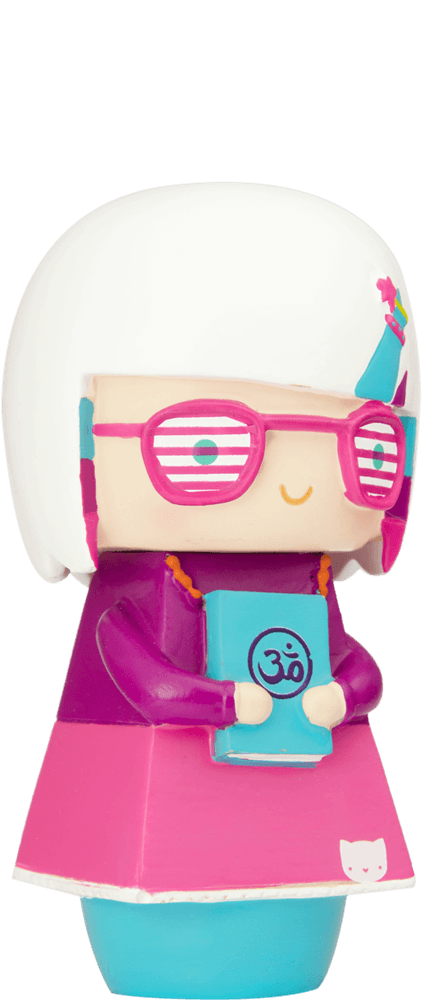 Enid Momiji doll has white hair, wears pink glasses, and holds a blue book with an Om symbol. Bright and cute collectible. — Momiji doll
