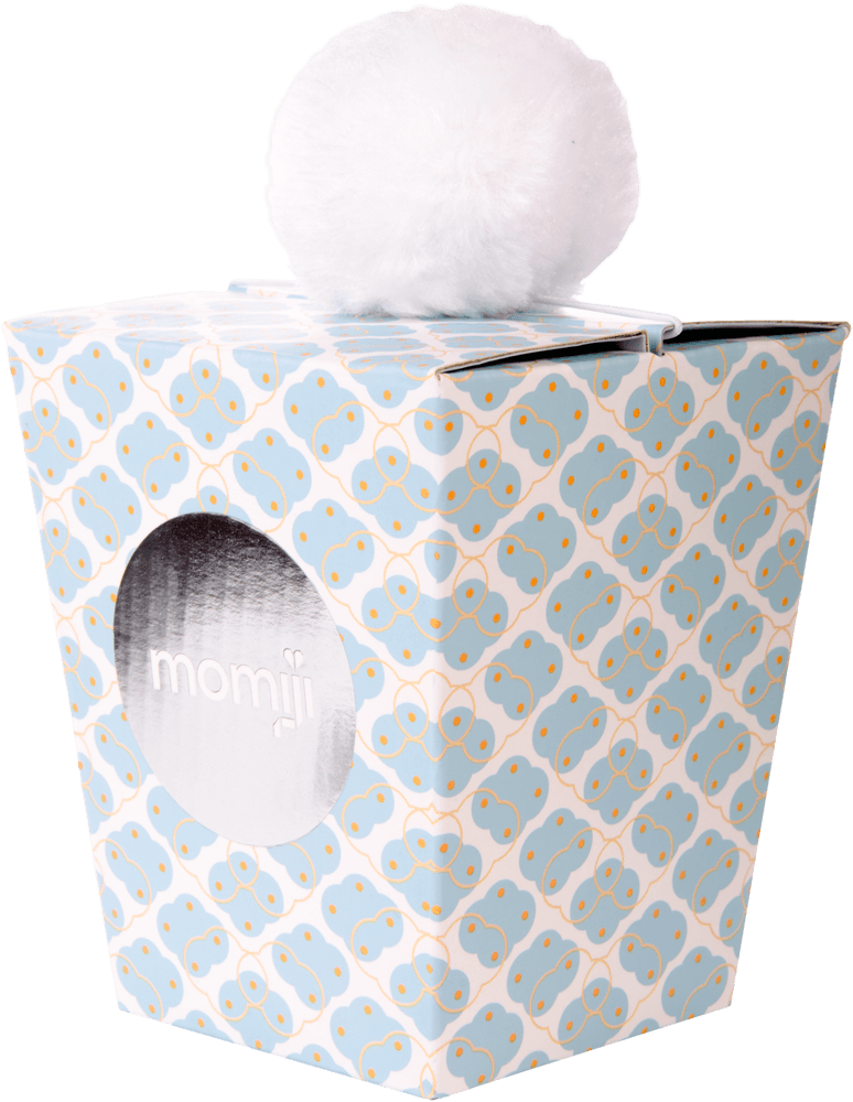 The Billie D Momiji doll is in a blue and white gift box with a round window and a big white pom-pom on top. — Momiji doll