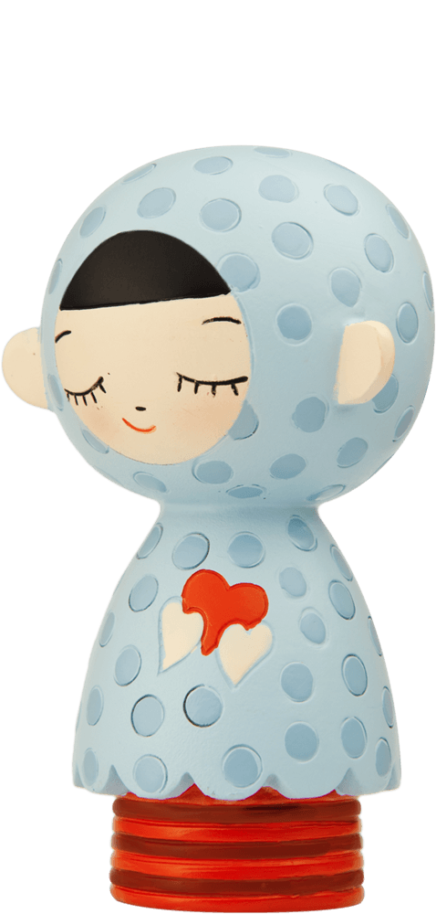 Momiji doll Douce with a blue polka-dot hood, closed eyes, and a red heart on its chest stands on a red base. — Momiji doll