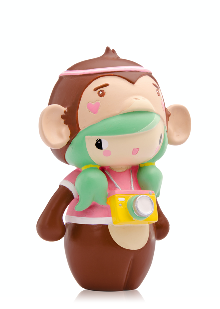 BFF Bessie Momiji doll with green hair in a brown monkey costume, pink outfit, and holding a yellow camera. — Momiji doll