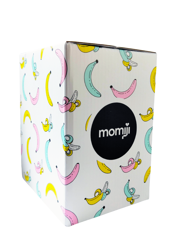 White box for Ellie Momiji doll, features colorful bananas and a black circle with "Ellie" on the side. — Momiji doll