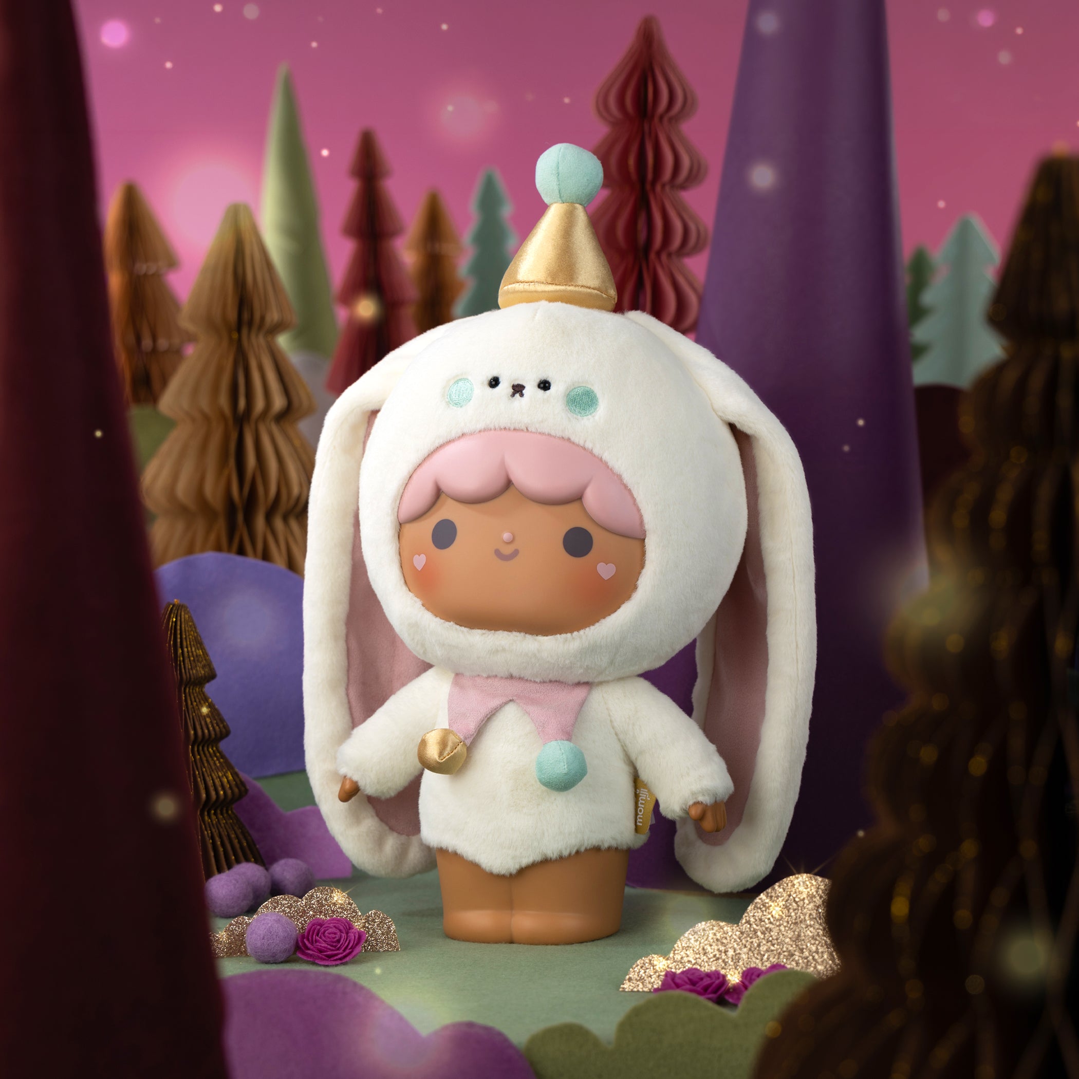 Bonbon Butterkins Momiji doll in a bunny suit with gold details stands in a pastel forest, cute and collectible. — Momiji doll