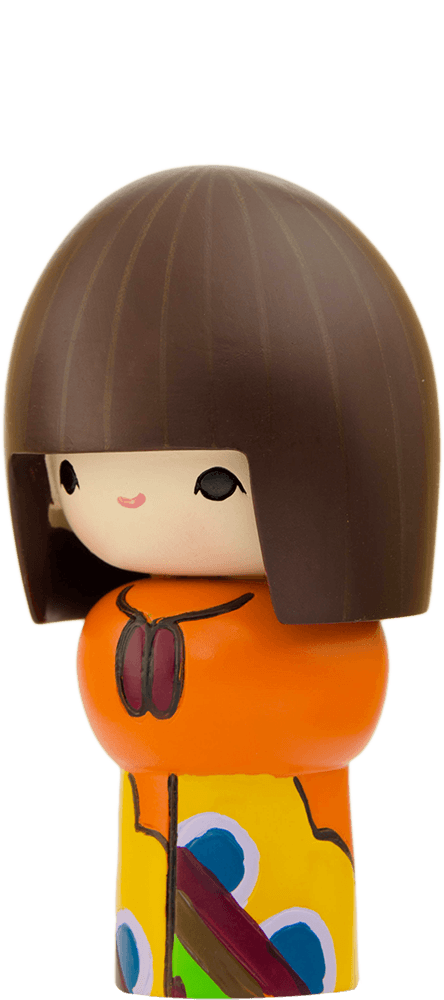 Rainbows Momiji doll with a round head, brown bob hairstyle, orange and yellow patterned outfit; collectible with hidden message. — Momiji doll