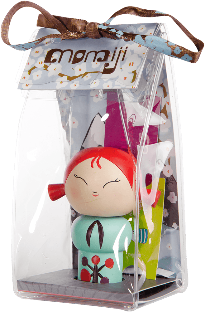 Laughing Momiji doll with red hair in a gift box, tied with a brown ribbon and a kawaii label. Collectible with secret message. — Momiji doll