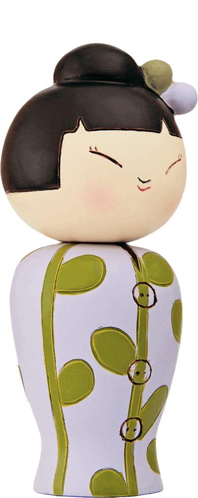 Higgledy-piggledy Momiji doll with black hair, floral hairpiece, white coat adorned with green leaves and green buttons. — Momiji doll