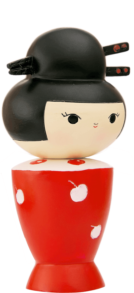 Cherries Momiji doll with black hair, red chopsticks, and a bright red dress patterned with white cherries. — Momiji doll