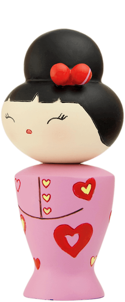 Cha cha cha Momiji doll with black hair, red bow, and pink dress adorned with red and yellow hearts. — Momiji doll