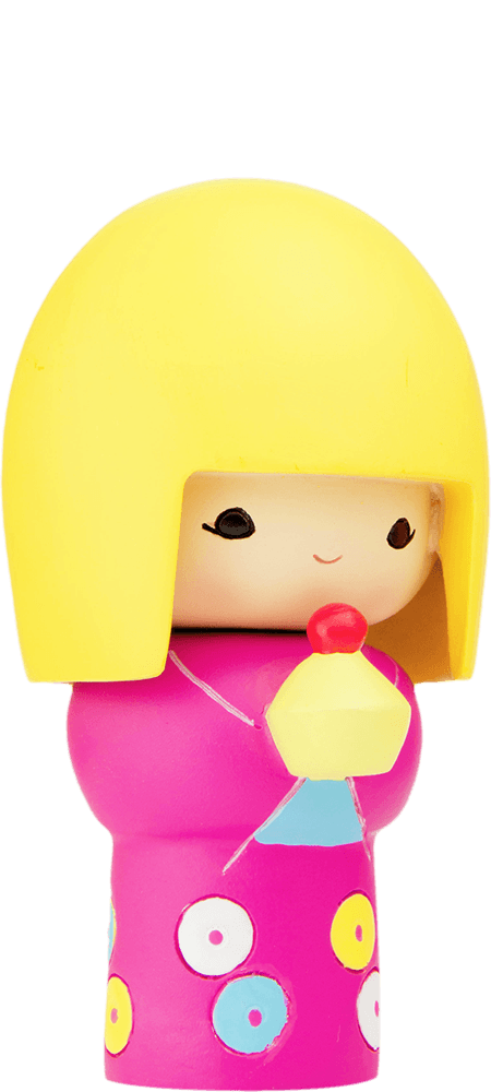 Pixie Momiji doll with a yellow bob, pink dress with colorful circles, and holding a small object topped in red. — Momiji doll