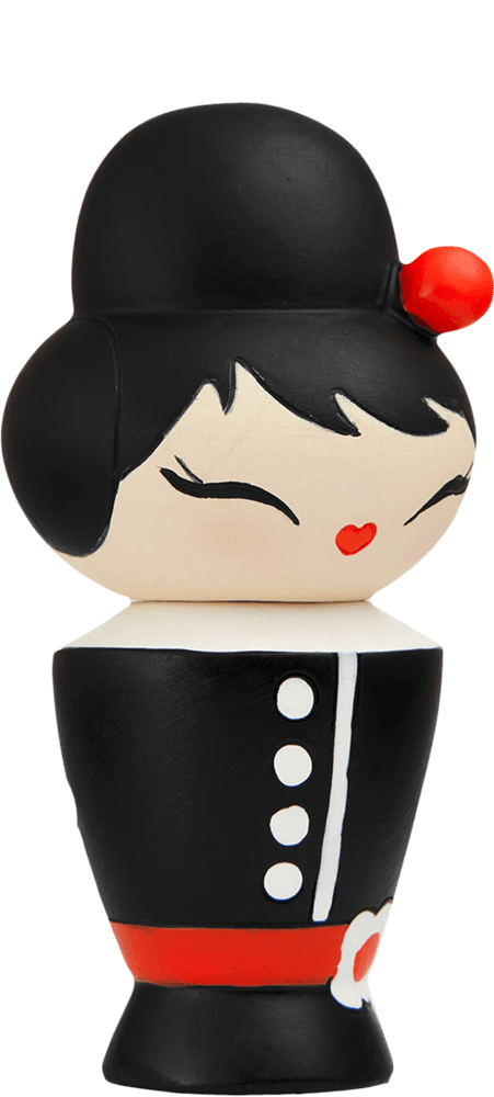 Coco Momiji doll with black hair, red bow, black outfit, white buttons, and a sweet closed-eye smile. — Momiji doll