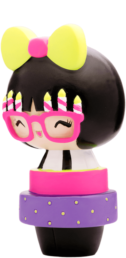 Birthday Girl Momiji doll with pink glasses, candle hair clips, and a purple skirt with yellow polka dots; collectible gift. — Momiji doll