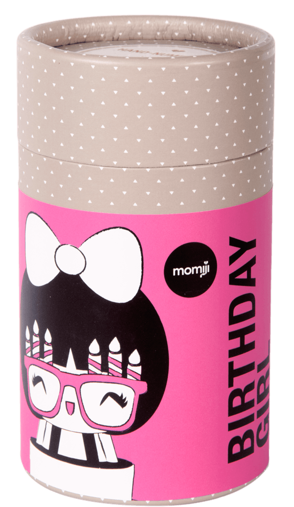 Birthday Girl Momiji doll on cylindrical gift box, with glasses and candles atop her head, in cute kawaii style. — Momiji doll
