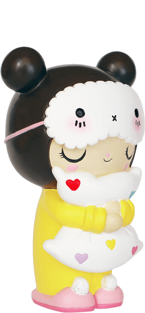 Dreaming hn Momiji doll in a bear hat, yellow pajamas, pink slippers, hugging a heart pillow. Cute and collectible. — Momiji doll