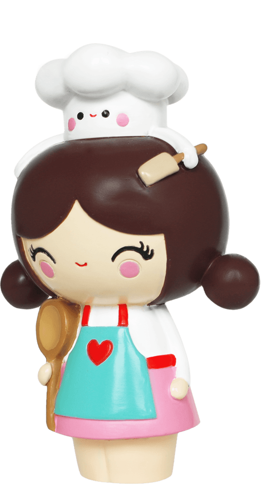 Cupcake HN Momiji doll: brown hair, blue apron, chef hat with smile, holds spoon and rolling pin. Kawaii collectible character. — Momiji doll