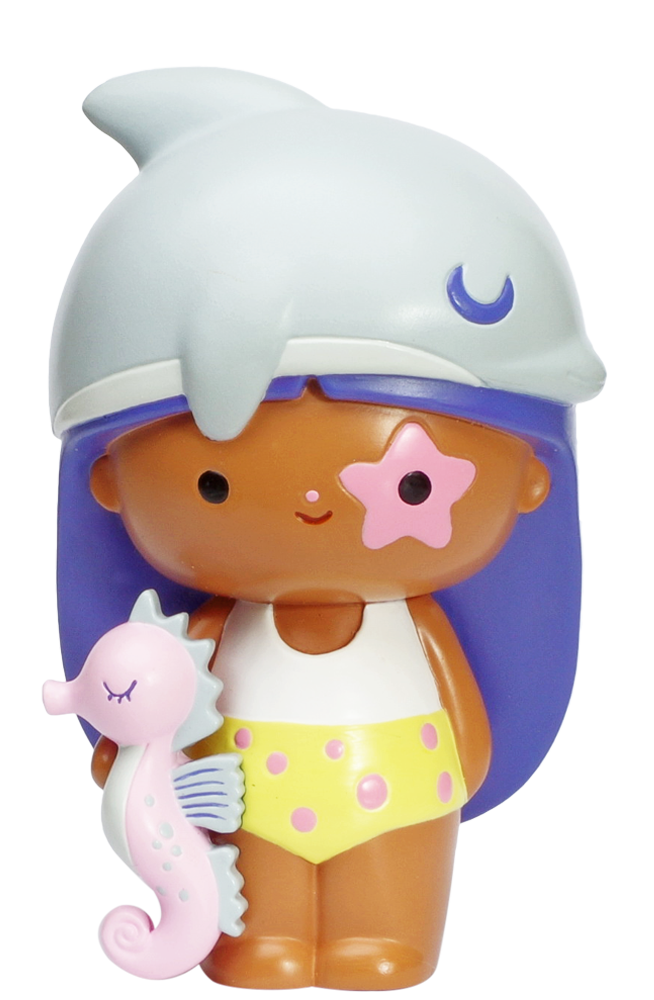 Beach Baby Momiji doll with brown skin, purple hair, dolphin hat, yellow shorts, and pink seahorse accessory. — Momiji doll