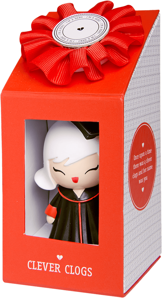 Clever Clogs Momiji doll wears a black graduation cap and gown, presented in a red box with a matching red ribbon. — Momiji doll
