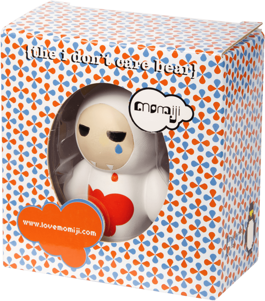 The I don't care bear" Momiji doll, white and kawaii, displayed in its box with signature hidden message feature. — Momiji doll