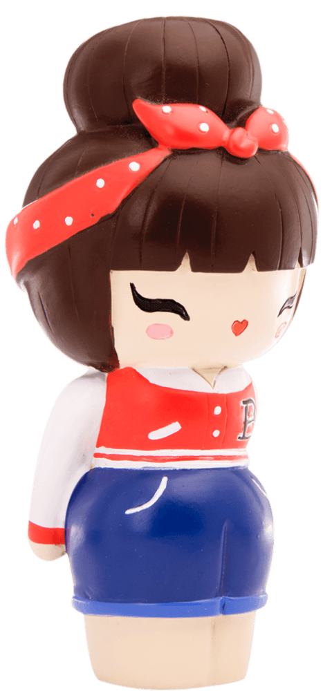 Rockabilly Momiji doll with red polka-dot headband, red jacket, blue skirt, and a heart-shaped cheek mark. — Momiji doll